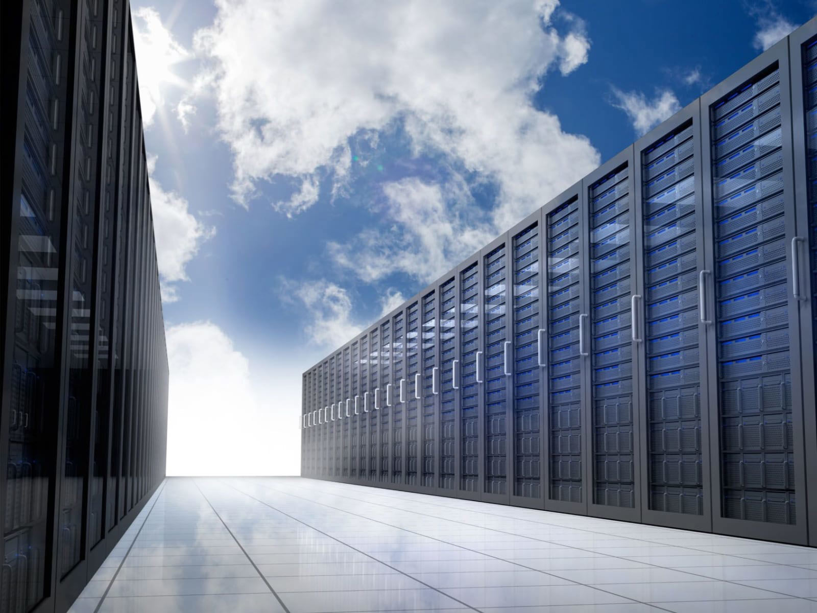 rows of server racks in a modern data centre